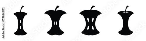 Collection of four distinct black apple core silhouettes isolated on a bright background