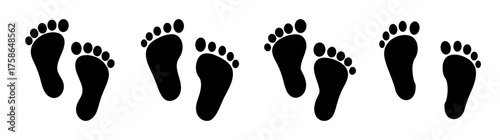 Adorable baby footprints set in black matte texture representing first stsvg and childhood growth journey