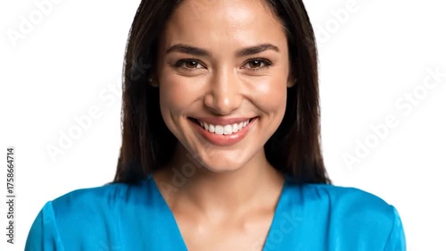 Portrait of a smiling woman in a blue top.