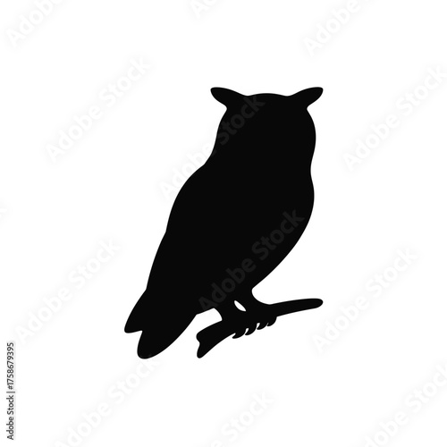 Black silhouette of a great horned owl perched on a branch against a white background