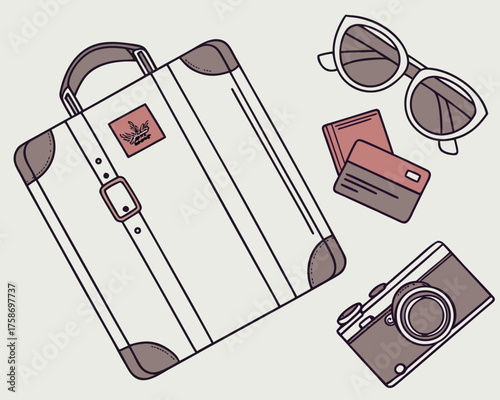 Suitcase, sunglasses, camera, and cards