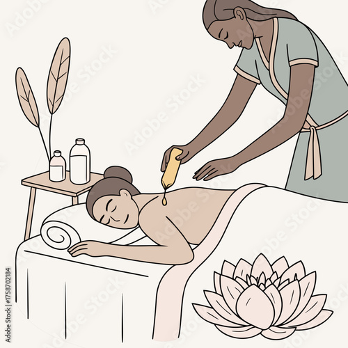 Woman receiving massage therapy with essential oil