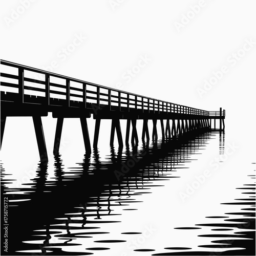 Long wooden pier extending into calm water with stark black and white reflection