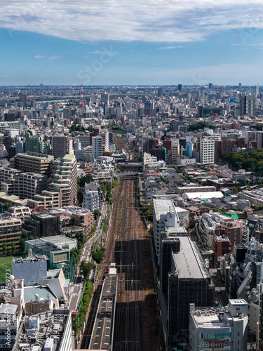 Photography Aerial view of a rail corridor in central Tokyo, train tracks and elevated roads