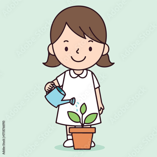 Little girl happily watering a growing plant in a pot