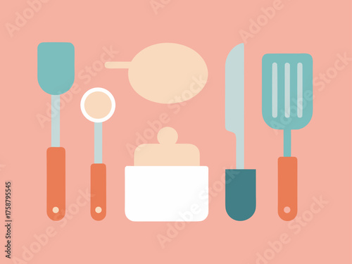 Kitchen utensils including spatula knife and ladle on a pink background flat lay