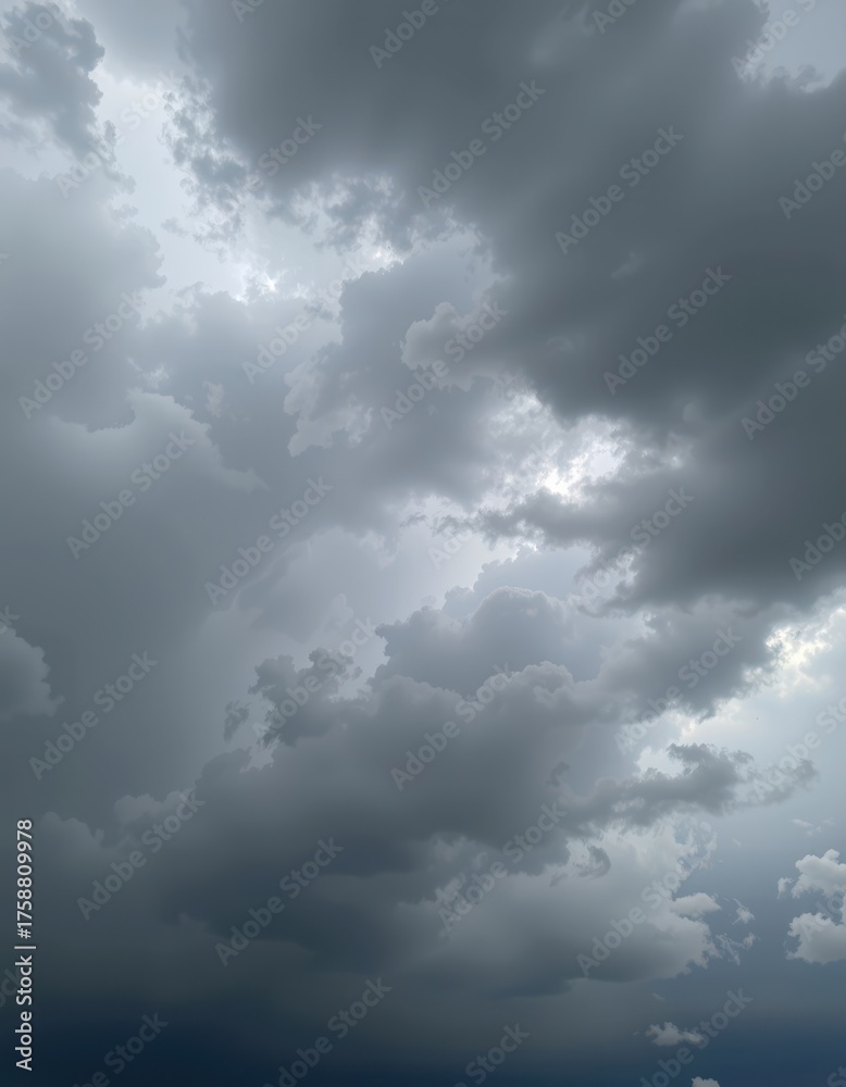 Obraz premium Gloomy sky with heavy, dark gray clouds creating an atmospheric, somber mood, dramatic, melancholic