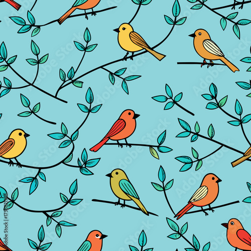 Charming seamless pattern featuring colorful cartoon birds perched on delicate branches with teal leaves against a light blue background