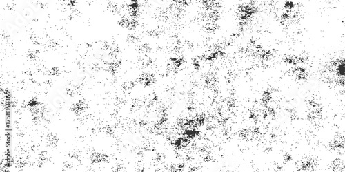 An abstract grunge background of a dirty old concrete wall with a textured vintage pattern and black dust paint surface design