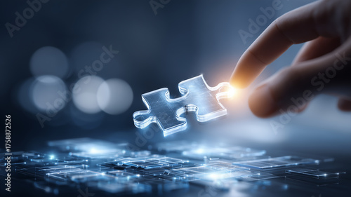A hand positioning a luminous puzzle piece into a digital grid, expressing problem solving, seamless integration, and strategic system architecture.
