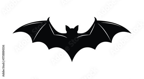 A striking black silhouette of a bat with outstretched wings against a white background a classic halloween symbol silhouette