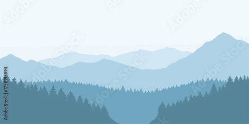 A majestic mountain landscape blanketed in morning fog with snow on the peaks