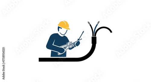 Electrician working with wires and tools wearing hard hat.