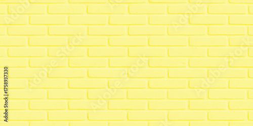 Old, abstract yellow brick wall texture with a pattern of cement and brown brickwork perfect as a background or wallpaper