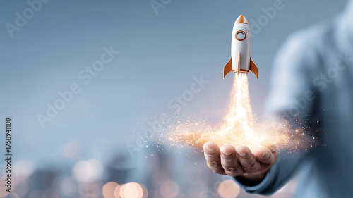 A hand launching a small rocket, representing startup growth product launch momentum and the ignition of innovative ideas into the market.
