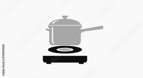 Simple Gray Cooking Pot on a Black Electric Stove.