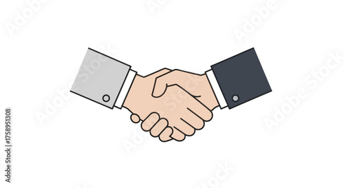 Two business people in suits shaking hands in agreement.