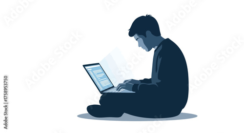 Focused young man sitting on floor typing on glowing laptop screen.