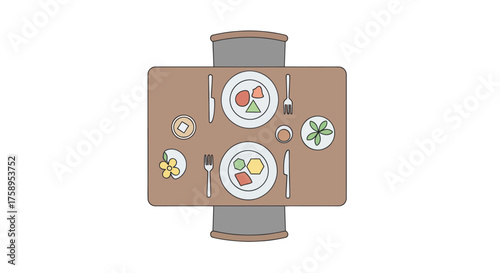 Overhead view of a dining table set for two with plates of food and cutlery.