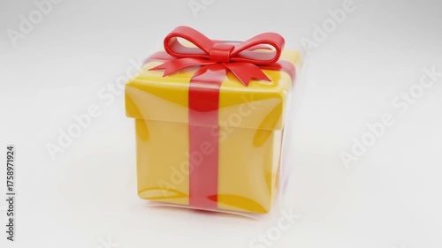 Yellow gift box with red ribbon