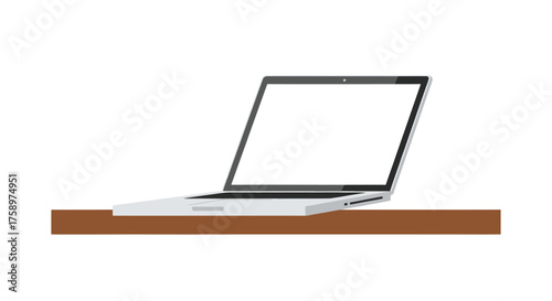 Sleek silver laptop with blank screen resting on a wooden surface.