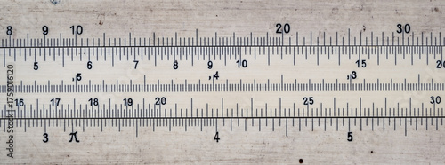 Old pocket slide rule mechanical calculator