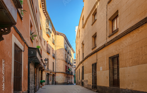 Calle del Codo (Elbow Street) with a bend  which is almost 90 degrees in Sol neighborhood. It is a short and narrow street from the Spanish Golden Age, beside Plaza de la Villa.