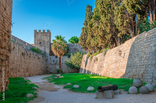 The medieval city walls, part of the fortification of the old town of Rhodos and the medieval moat. In Rhodos Island, Dodecanese, Greece.