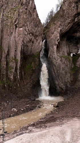 A beautiful view of a waterfall in the North Caucasus Mountains. Landscape and nature of the North Caucasus