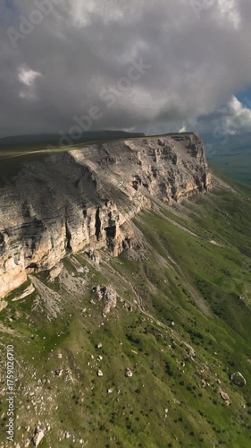 Aerial view of a mountain plateau with high cliffs. Landscape and nature of the North Caucasus