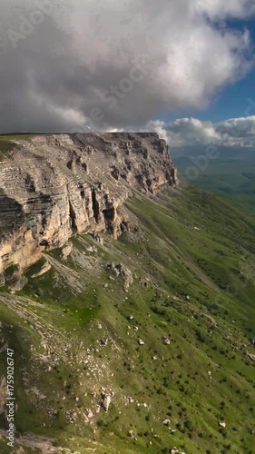 Aerial view of a mountain plateau with high cliffs. Landscape and nature of the North Caucasus