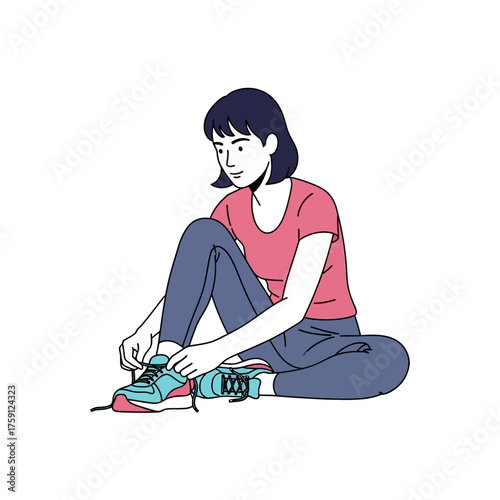 Young woman tying shoelaces on her sneakers, preparing for a run.