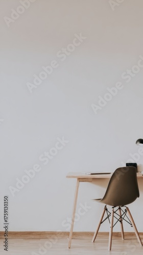 organized. A clean and simple office corner featuring a wooden desk and chair...