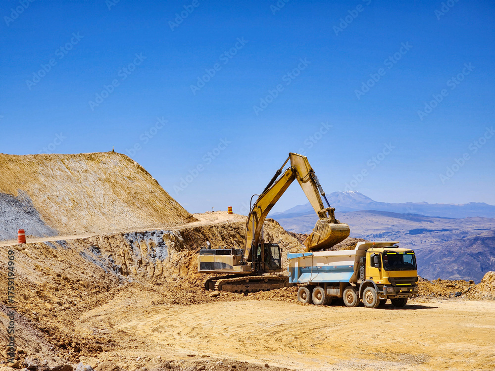 Obraz premium Construction machinery working in open pit mine