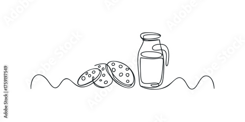 Glass bottle with milk and cookies