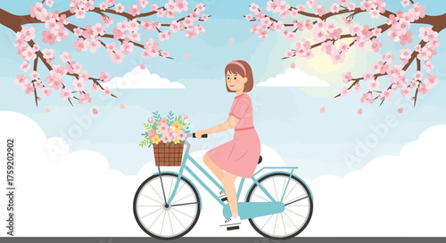 A woman in a pink dress rides a bicycle with a basket of flowers under cherry blossom trees.