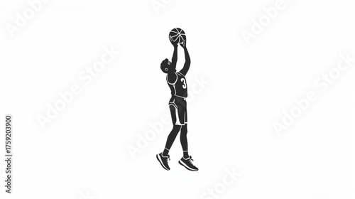 Silhouette of a Basketball Player Shooting a Jump Shot Towards the Hoop