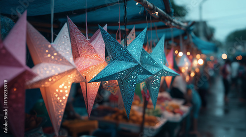 Vibrant star lanterns hanging in market stalls for Simbang Gabi celebration in the Philippines