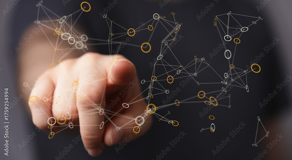 Fototapeta premium A hand reaching out to touch a digital network of interconnected points, symbolizing connection, communication, and data flow in a modern tech e