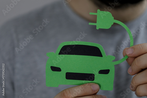 Eco-friendly EV being charg...