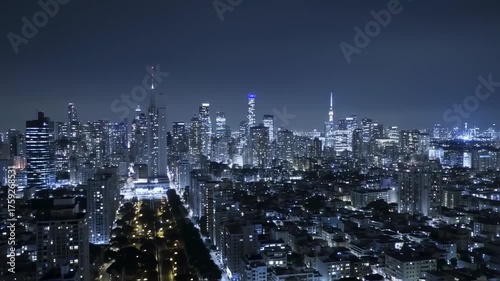 Wallpaper Mural Nighttime Cityscape - A Stunning View of Illuminated Skyscrapers and Urban Landscape. Torontodigital.ca