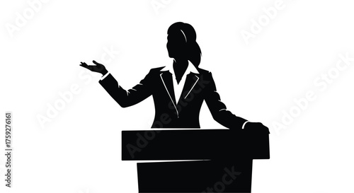 Confident speaker gesturing while presenting from a podium, conveying authority and engagement.