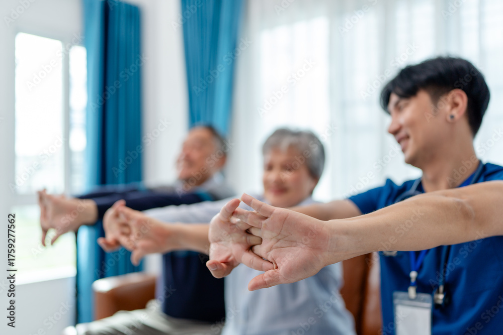 Obraz premium focus on hands of physiotherapist, senior couple practices muscle strength exercises arms and hands. home caregiver nurse visit retire couple for health check up recovery process medical service