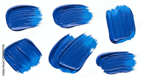 Collection of Six Vibrant Blue Paint Strokes and Smears on a White Background Showcasing Texture and Brushwork