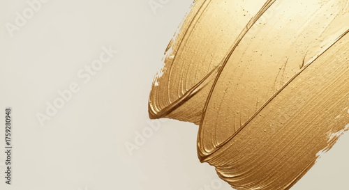 Textural strokes of rich golden metallic paint create a luxurious and opulent abstract background with a subtle shimmer and depth