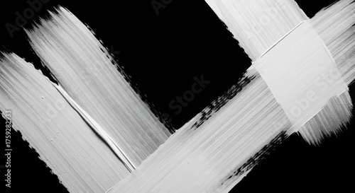 Abstract strokes of thick white paint applied with broad brushstrokes across a stark black background creating a modern artistic visual representation of dynamic energy and creative expression
