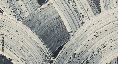 Abstract monochromatic textured brush strokes creating a dynamic pattern of curved lines and varied surfaces in shades of gray and white