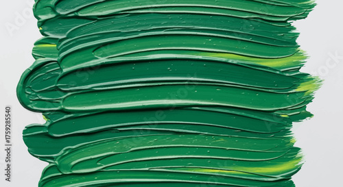 Thick Impasto Brushstrokes of Vibrant Green Oil Paint on a White Canvas Creating a Textured Abstract Artwork