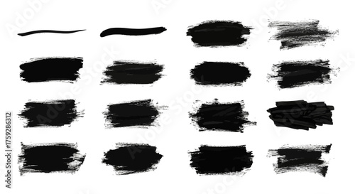 A Collection of Black Paint Brush Strokes and Smears in Various Sizes and Textures Displayed on a White Background