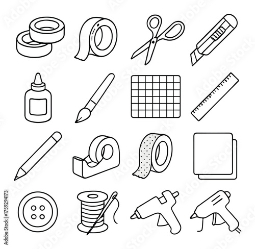 Assorted crafting tools and supplies set on gray background